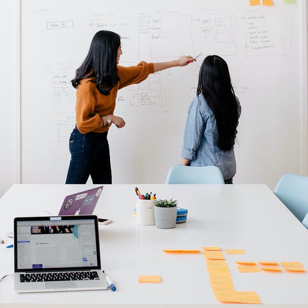 Two Woman Brainstorming